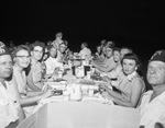 Group at picnic table by W. D. Smith