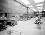 Interior of bank decorated with flowers by W. D. Smith