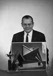 W. D. Smith holding photo with trophy by W. D. Smith