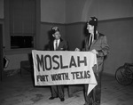 Two Shriners holding a Moslah, Fort Worth, Texas banner by W. D. Smith