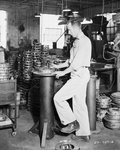 A man manufacturing reconditioned automobile break shoes by W. D. Smith