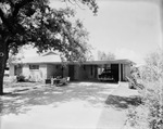 Exterior view of Miller Tom J.'s residential house by W. D. Smith