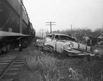 Car accident between a train and a 1955 Pontiac by W. D. Smith