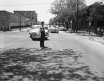 Car accident between a motorcycle and a car at Ballinger and Texas Street by W. D. Smith