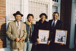 William Blair, Jr. with Elite News newspapers showing coverage of "The People's Parade" held in honor of MLK