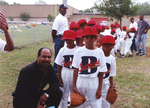 Ron Stinnett with little league baseball team