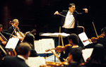 Director Conducting Orchestra by University Photographer