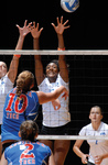 Mavericks Volleyball Team at Net by University Photographer