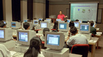 Professor Lecturing in Computer Lab by University Photographer