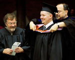 Student at graduation ceremony by University Photographer