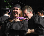 Student at graduation ceremony by University Photographer