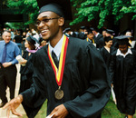 Student at graduation ceremony by University Photographer