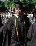 Student at graduation ceremony by University Photographer