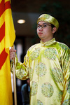 Student Holding Flag by University Photographer