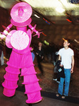 Student Looking at Costume by University Photographer