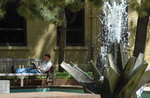 Student Reading by University Photographer