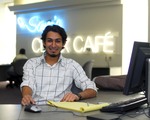 Student Studying at Sam's Click Cafe by University Photographer