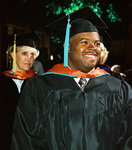 Students at graduation ceremony by University Photographer