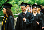 Students at graduation ceremony by University Photographer