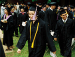 Students at graduation ceremony by University Photographer