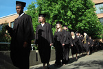 Students at graduation ceremony by University Photographer