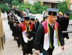 Students at graduation ceremony by University Photographer