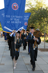 Students at graduation ceremony by University Photographer