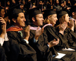 Students at graduation ceremony by University Photographer