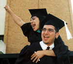 Students at graduation ceremony by University Photographer