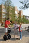 Students Conversing Outdoors by University Photographer