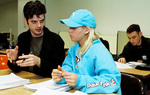 Students Discussing Coursework by University Photographer